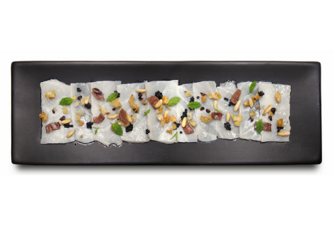 Carpaccio di baccalà con pane croccante alle olive, Perlage di Tartufo, menta, acciughe e pinoli – Chef Andrea Ferrero